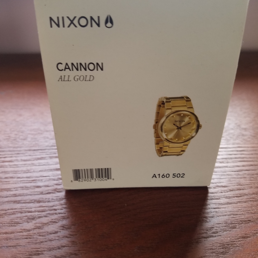 Official Nixon gold watch